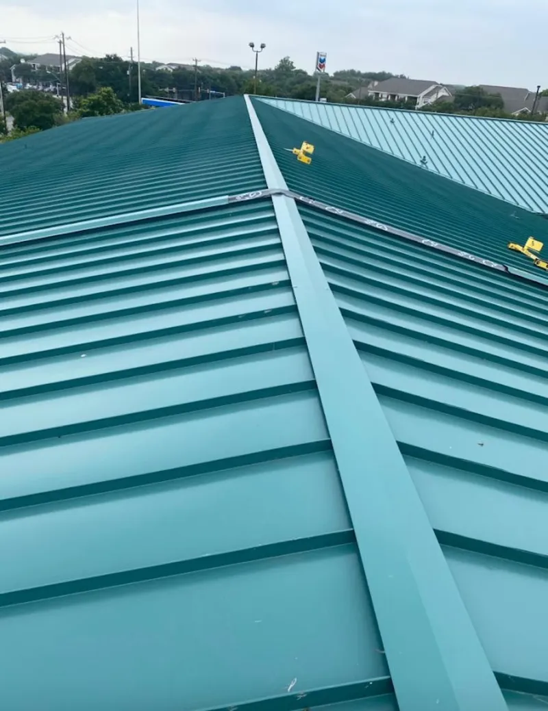 Green commercial metal roof ridge and valley for Metal Roof Repair in Marlboro Village