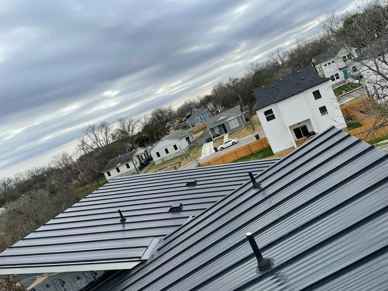 Standing seam metal roof panels with vents for Skylight Repair in Marlboro Village
